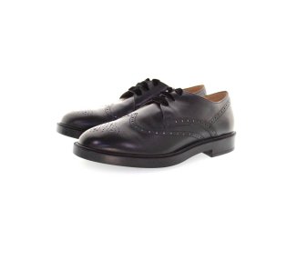 Handmade woman`s lace-up shoes in genuine leather