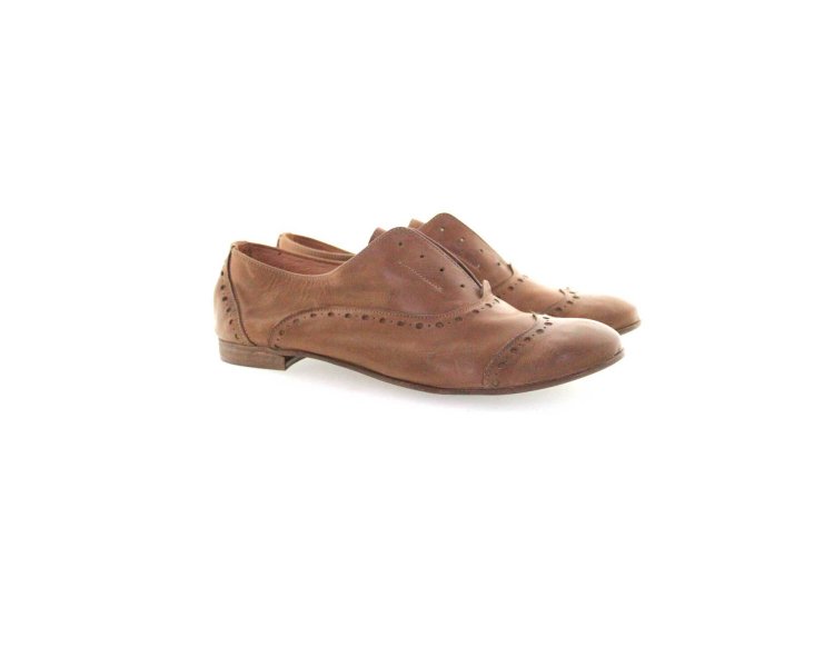 Handcrafted women`s shoes in genuine leather