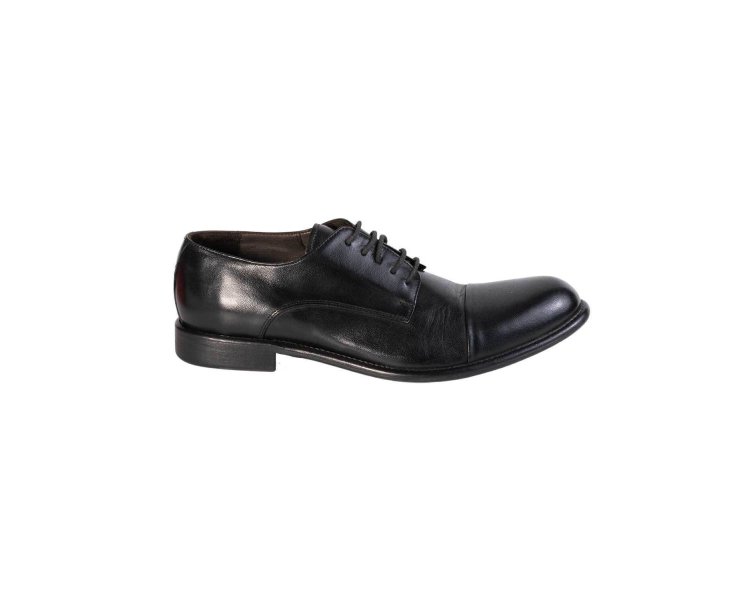 Handmade men`s lace-up shoes in genuine leather