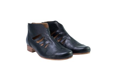 Handmade woman`s lase-cut ankle bootsi in genuine leather