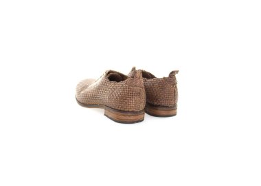 Handmade woman`s lace-up shoes in woven genuine leather